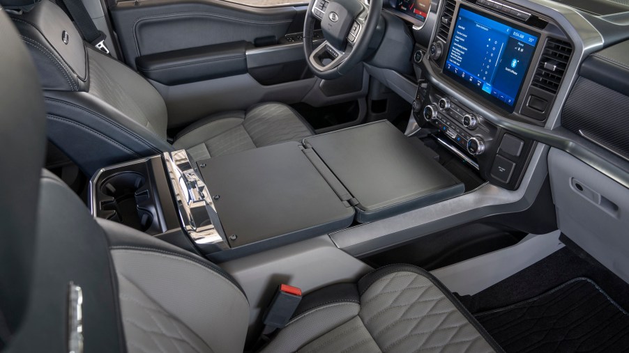 A 2021 Ford F-150 pickup truck interior with dark-gray ventilated seats