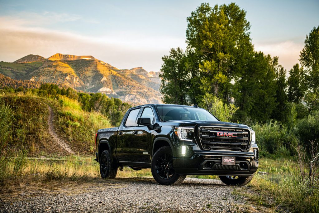 A 2021 GMC Sierra 1500 parked in a field