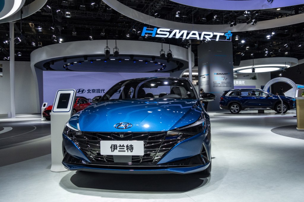 A blue 2021 Hyundai Elantra on display