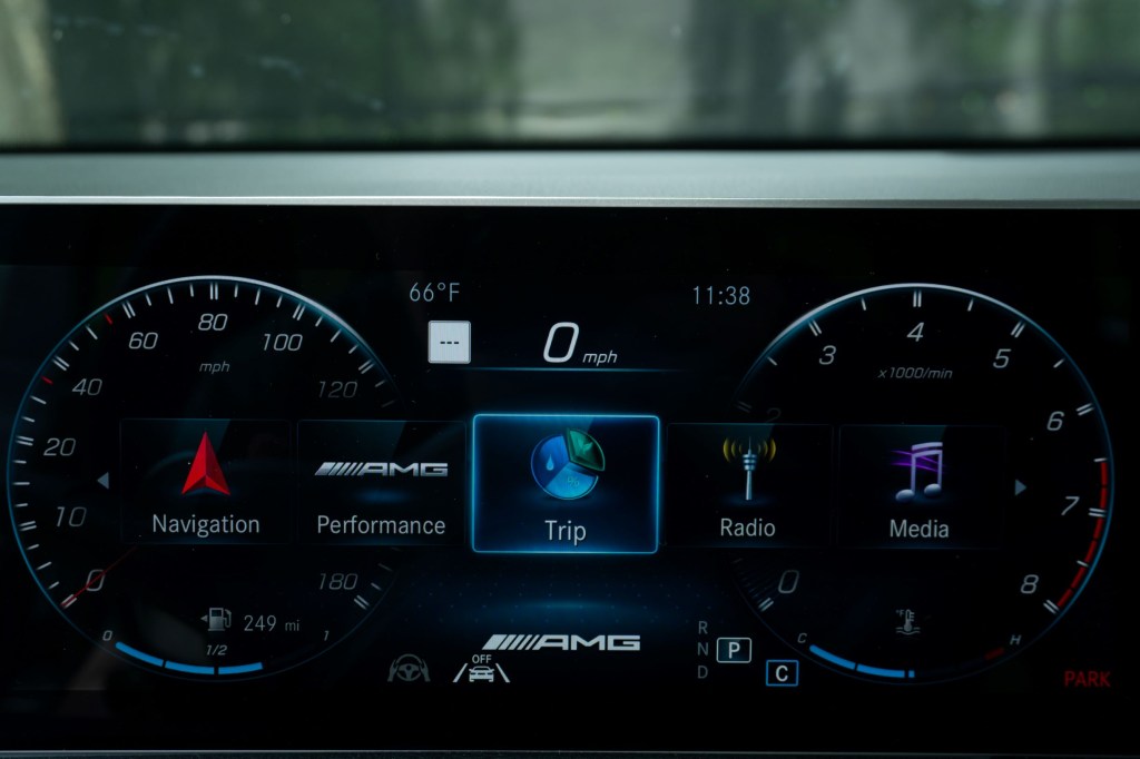 The digital gauge cluster on a 2021 Mercedes-AMG GLB 35 showing MBUX infotainment system configuration options