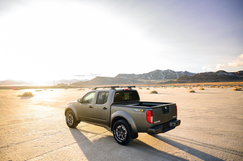 A 2021 Nissan Frontier at sunset, one of the best affordable new pickups under $30,000