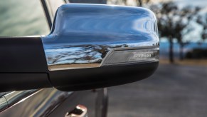 The driver's side mirror of a 2021 Ram 1500 Limited full-size pickup truck
