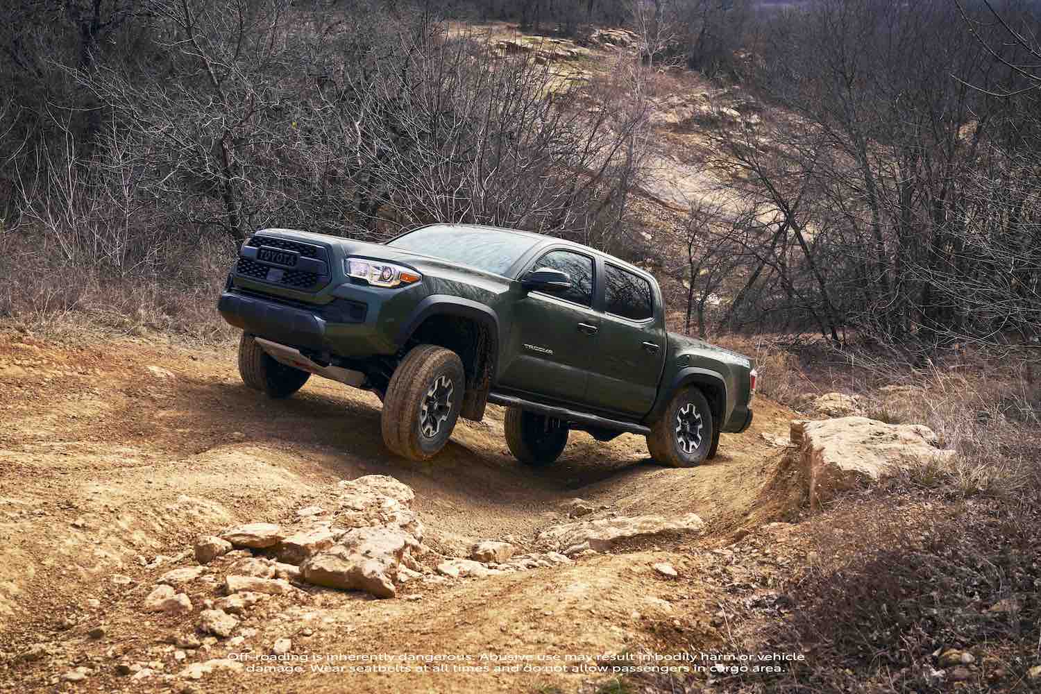 The 2021 Toyota Tacoma going off-roading, the Tacoma TRD Pro is one of the best new off-road pickups according to Edmunds