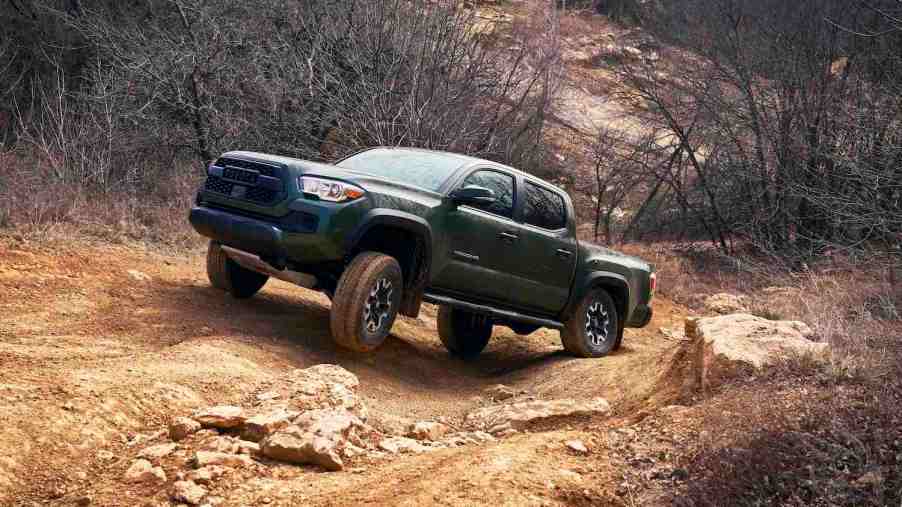 The 2021 Toyota Tacoma going off-roading, the Tacoma TRD Pro is one of the best new off-road pickups according to Edmunds