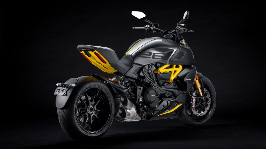 The rear 3/4 view of a yellow-and-matte-gray-and-black 2022 Ducati Diavel 1260 S Black and Steel