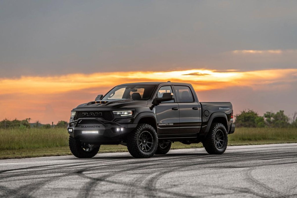 A black Hennessey Mammoth 1000 TRX at dusk