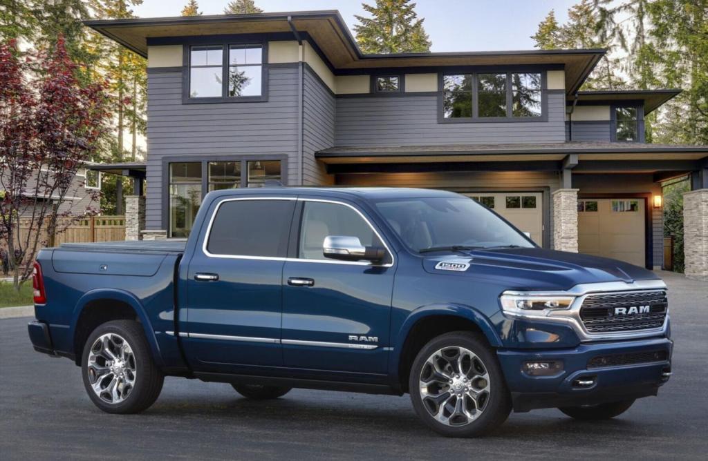 The 2022 Ram 1500 Limited 10th Anniversary Edition parked near a home