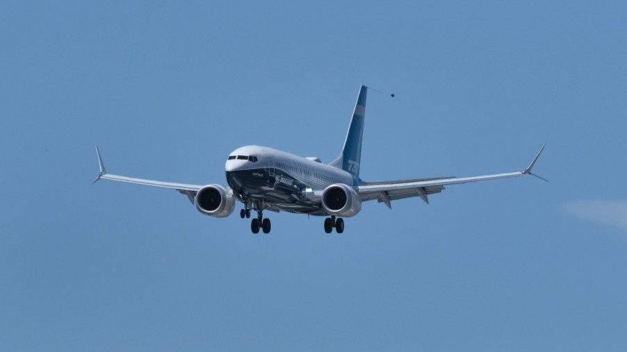 A Boeing 737 MAX airplane lands following an FAA recertification flight at Boeing Field in Seattle in June 2020