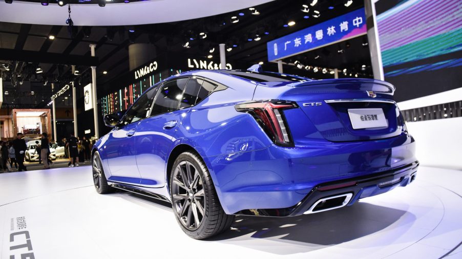 A blue Cadillac CT5 car is on display during the 17th Guangzhou International Automobile Exhibition at China Import and Export Fair Complex