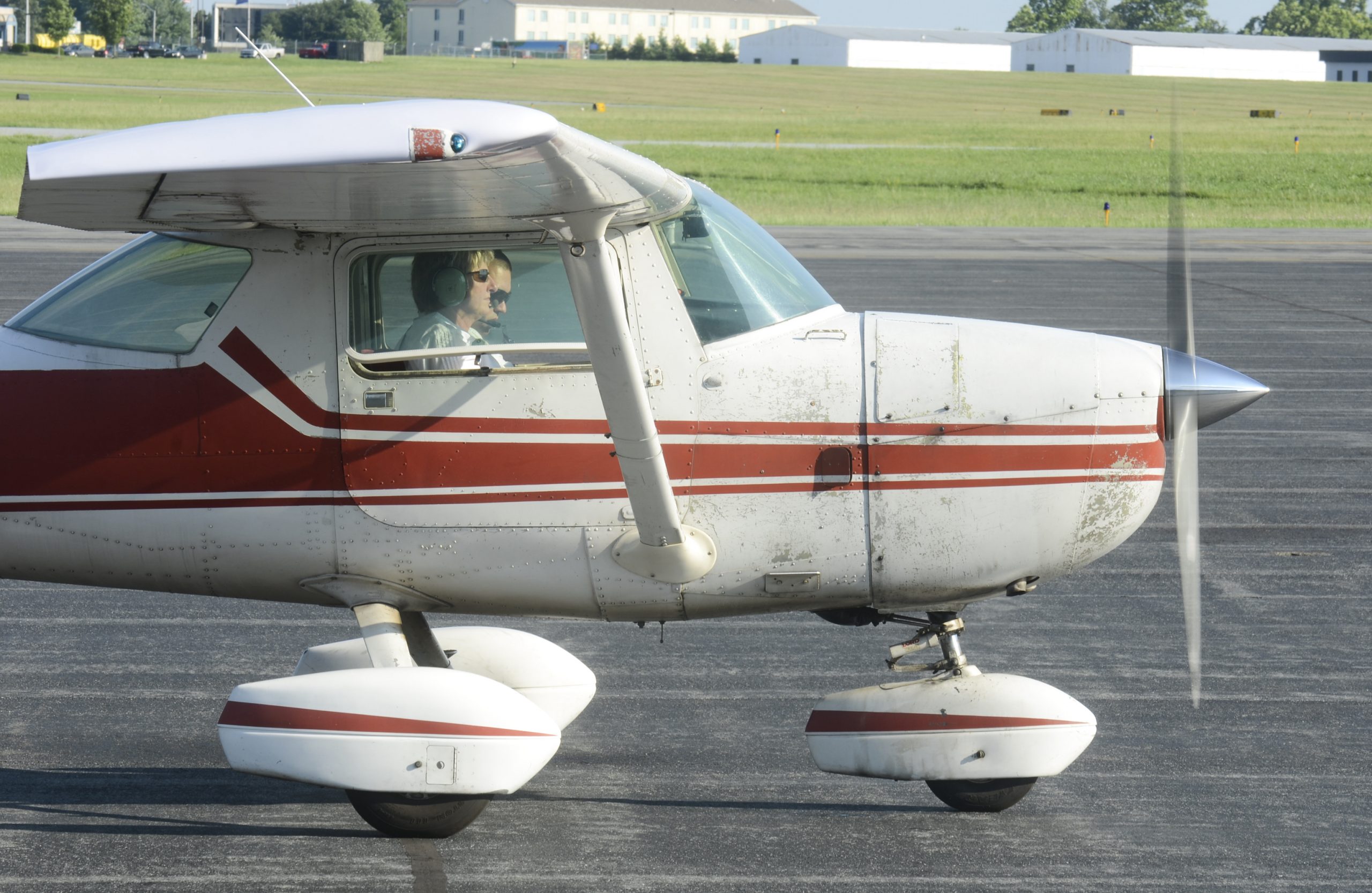 PASandra Moore in the cockpit of a Cessna 150 with her student Simon Burkhardt, of Wyomissing, on the tarmac at Reading Air Charter