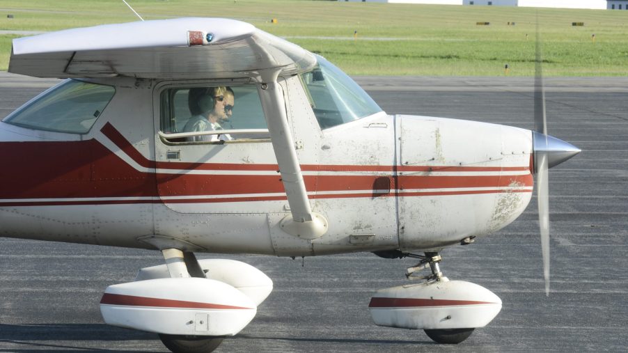 PASandra Moore in the cockpit of a Cessna 150 with her student Simon Burkhardt, of Wyomissing, on the tarmac at Reading Air Charter