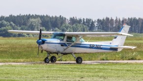 A Cessna 152 airplane taxies on small runway on June 14, 2019