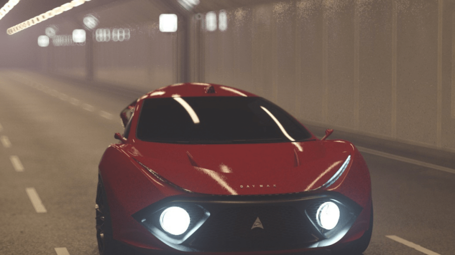 A red Daymak EV in a tunnel