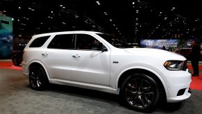 A white Dodge Durango SRT SUV on display