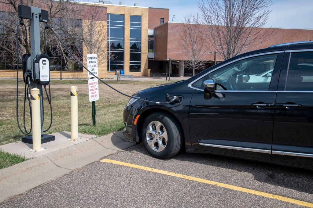 An EV parked at a Level 2 charging station in White Bear Lake, Minnesota, in America's Midwest