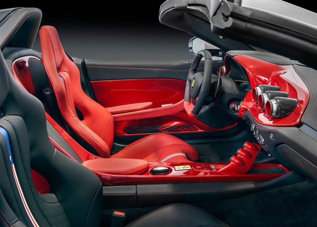 An image of a Ferrari F60 America in a photo studio.