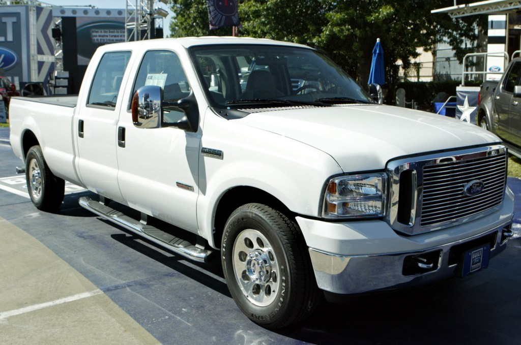 A white Ford F-350 pickup truck parked on a street