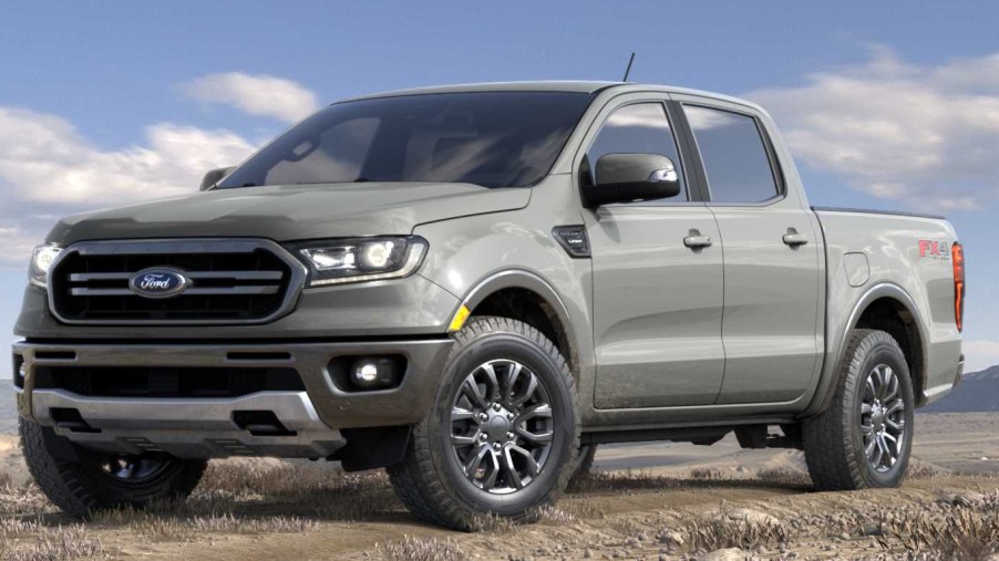 The grey 2021 Ford Ranger pickup truck sitting in a field