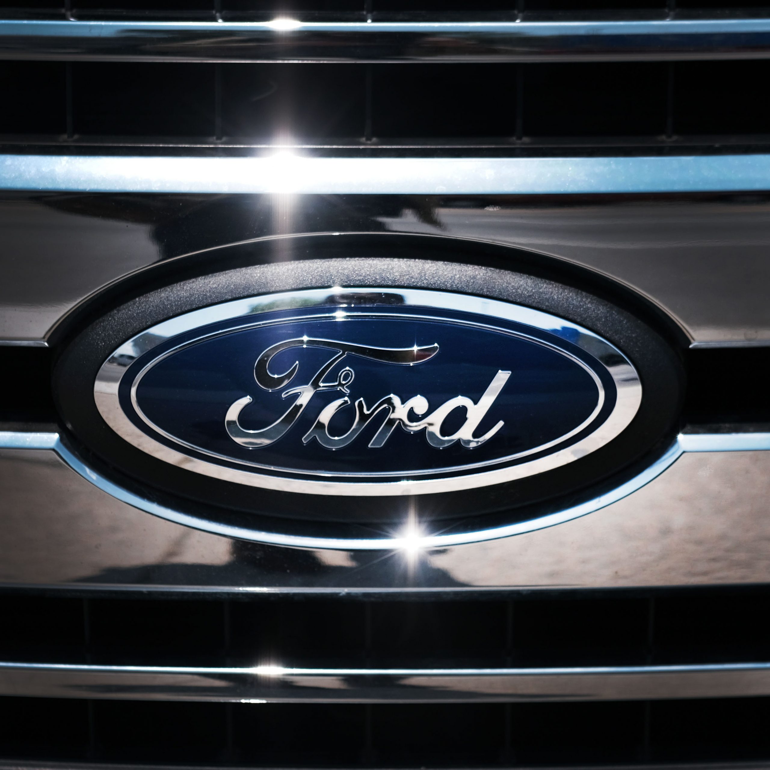 Ford logo on the grille of a new ford model
