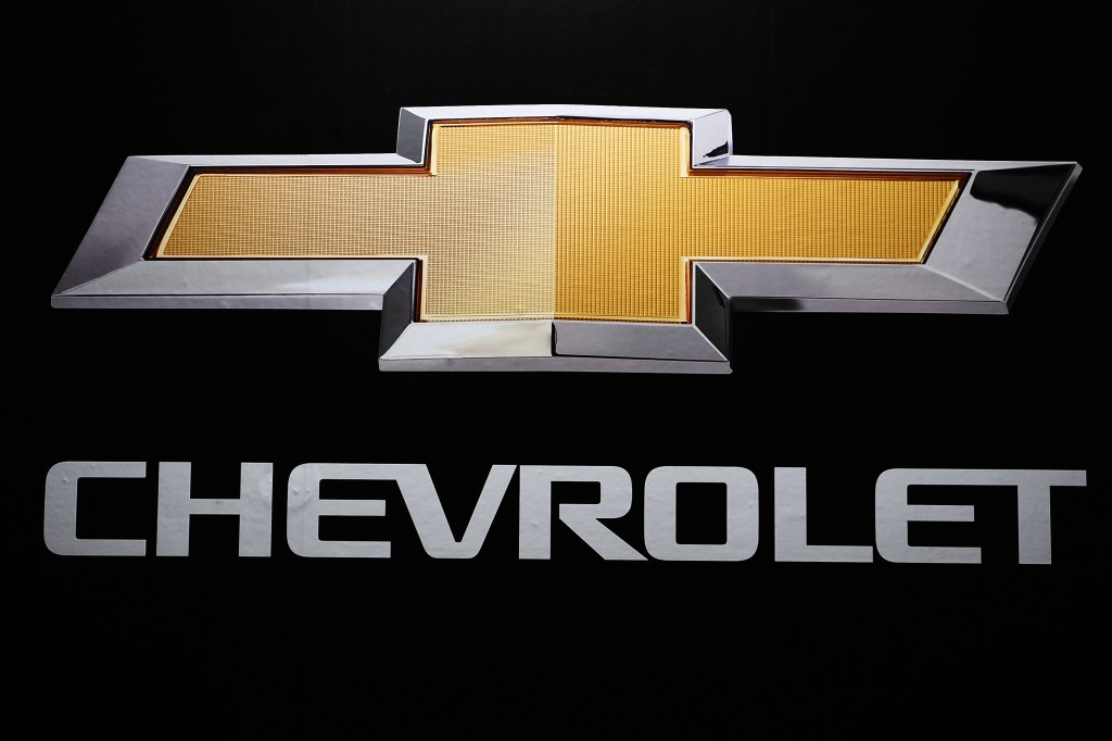 The gold Chevrolet logo and text on a black background
