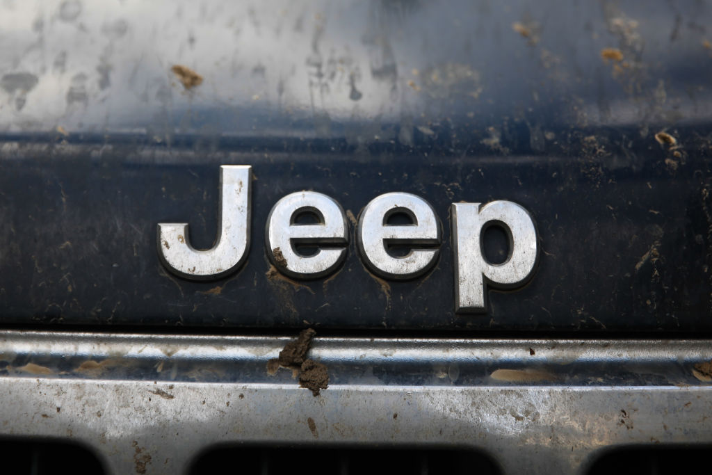 A dirty Jeep badge