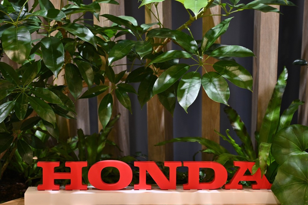 Honda's logo among plants in an office