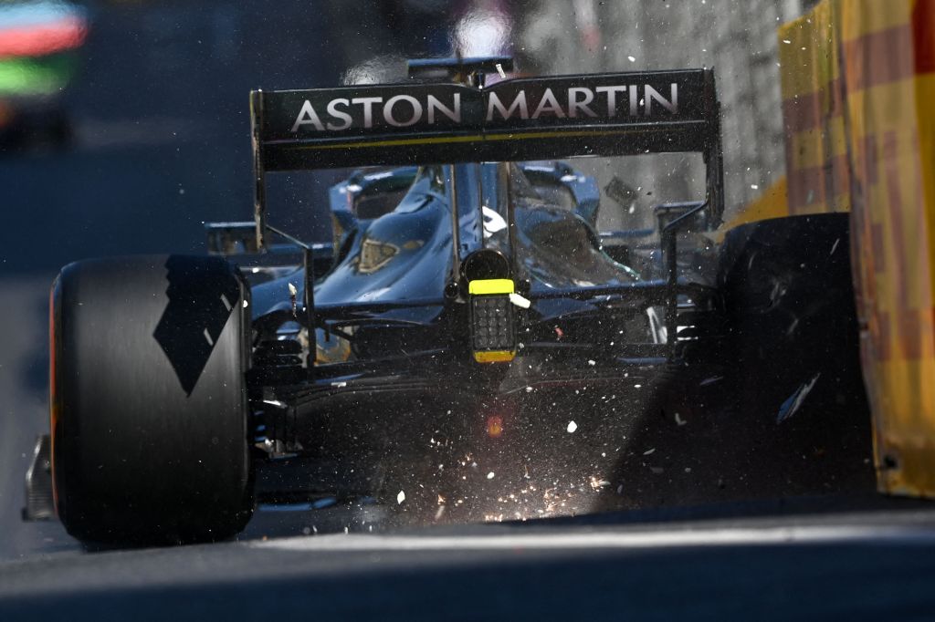 Lance Stroll's Aston Martin mid-crash after his Pirelli tires failed