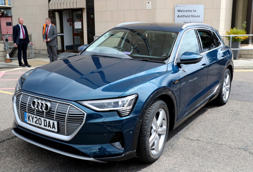 A blue Audi E-Tron SUV
