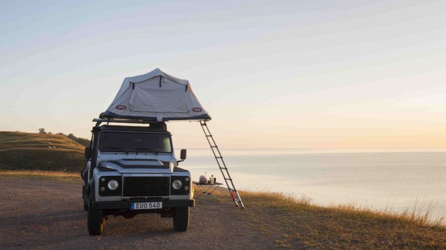 A roof tent mounted on a Land Rover