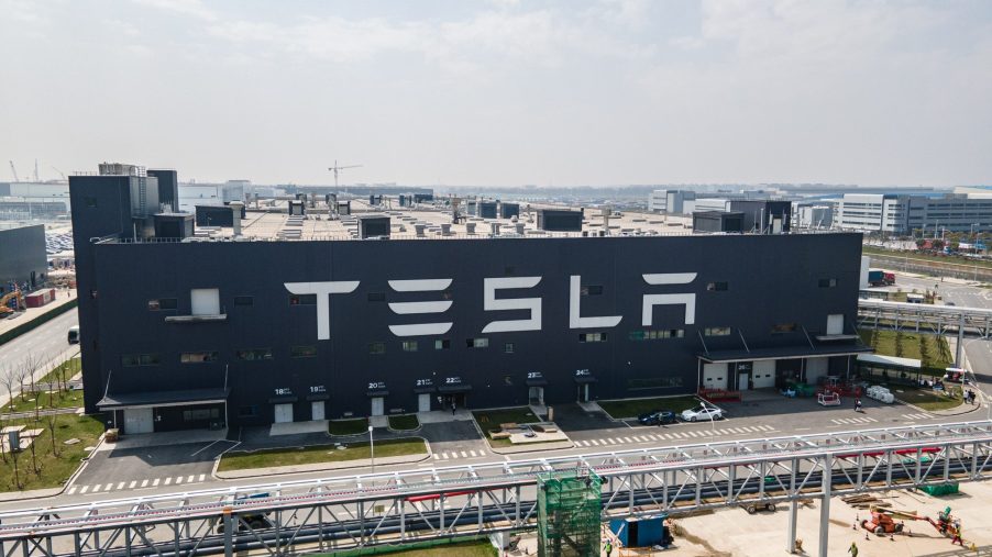 Tesla's factory in Shanghai with the brand's logo painted on the side