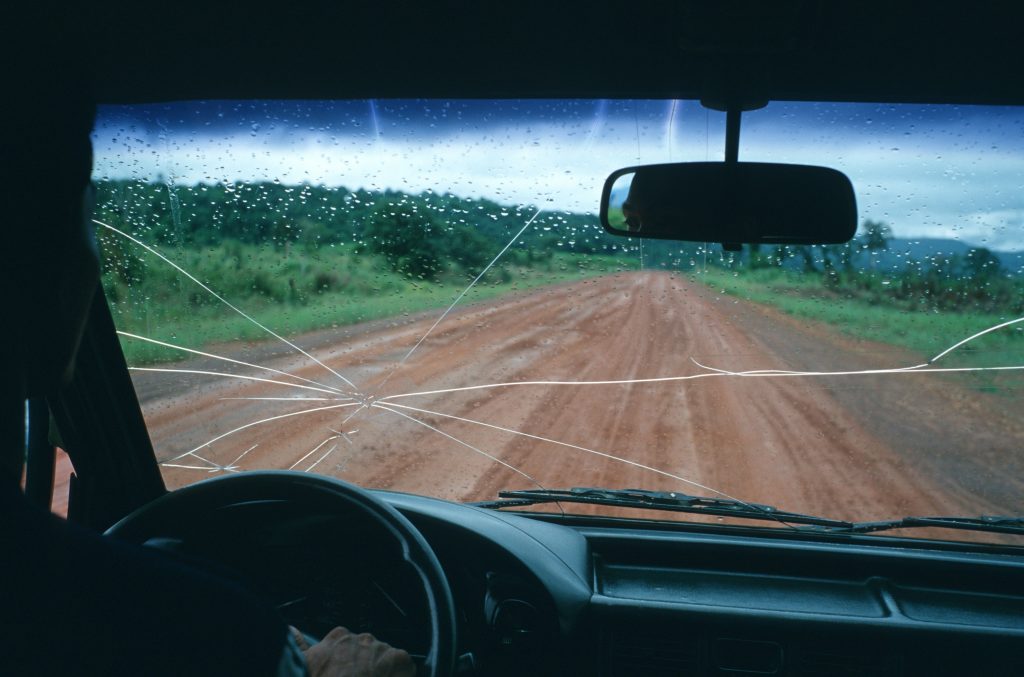 A cracked windscreen on an SUV in Cambodia