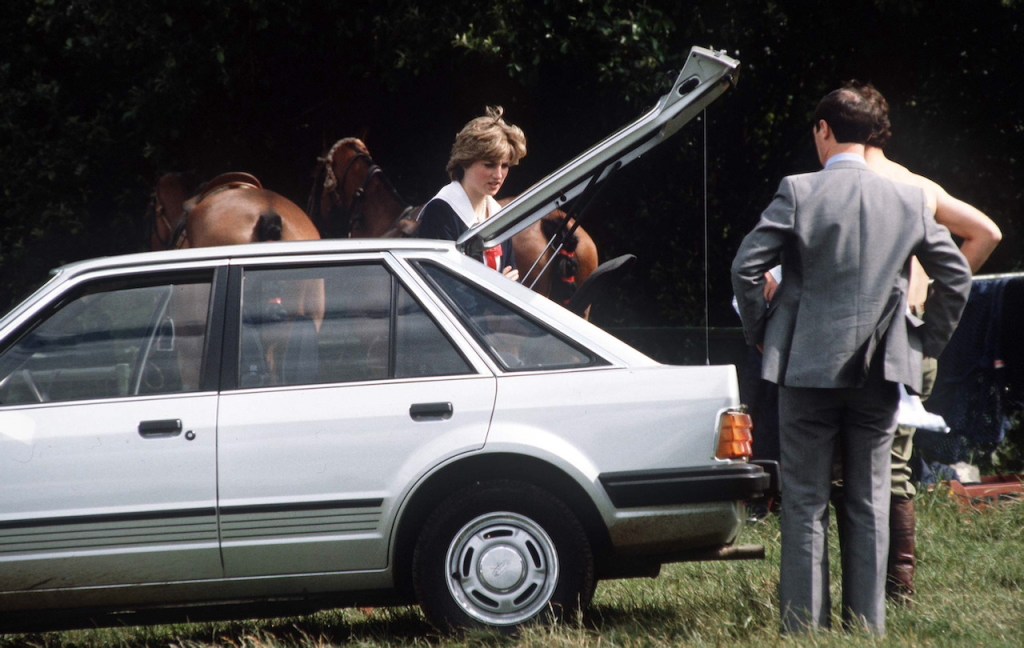 An image of Princess Diana driving her Ford Escort.