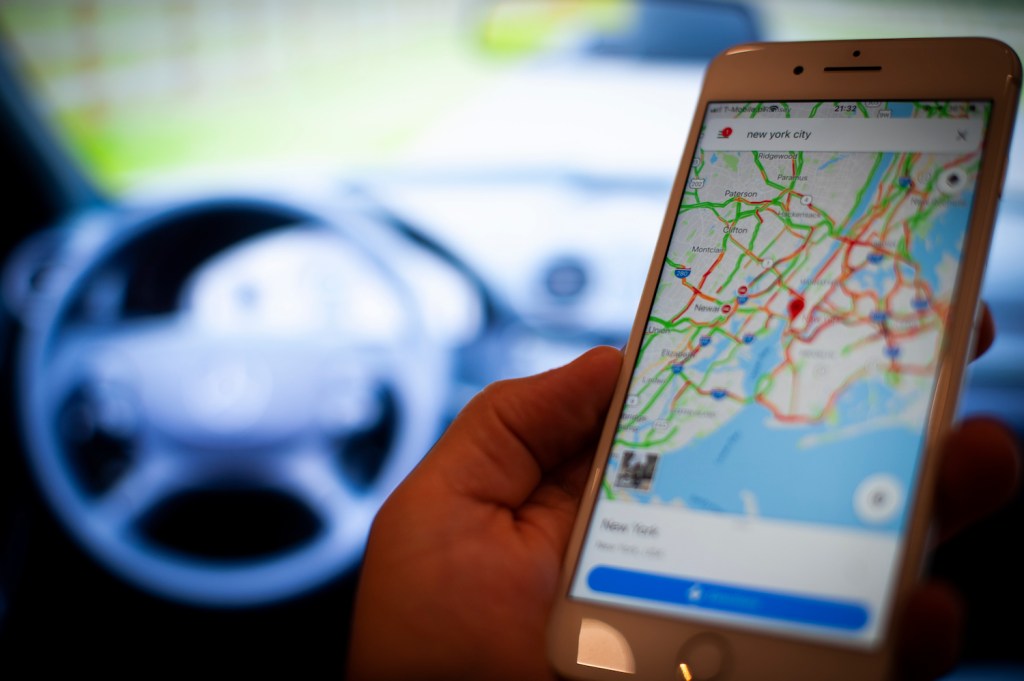 A mobile phone with the Google Maps app open.