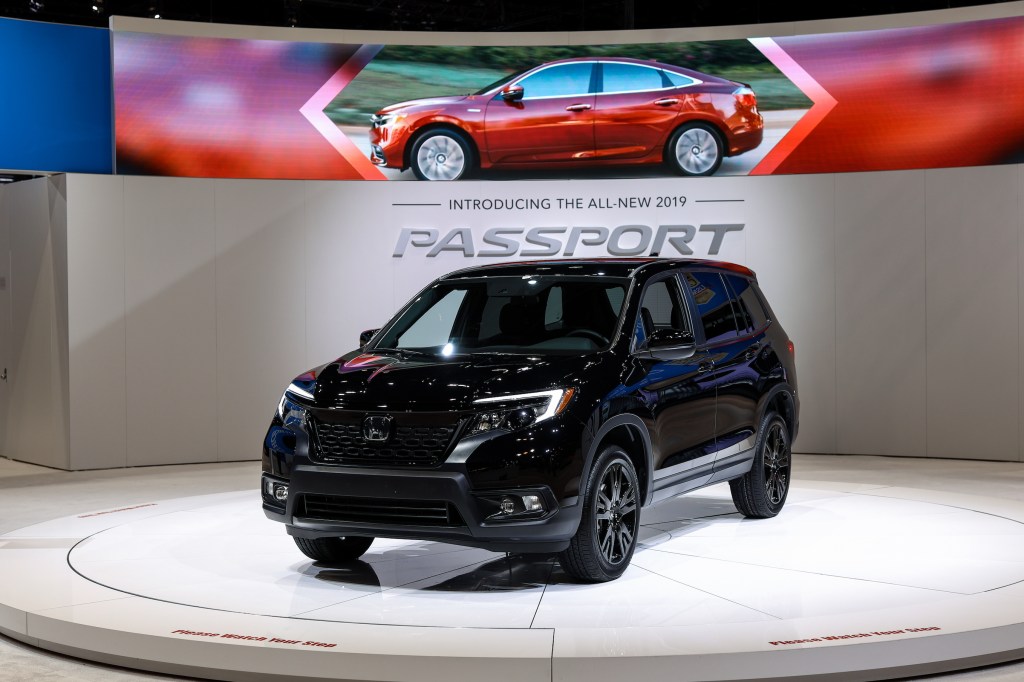A black Honda Passport AWD Sport is on display at the Chicago Auto Show.