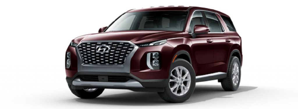 A maroon 2021 Hyundai Palisade against a white background.