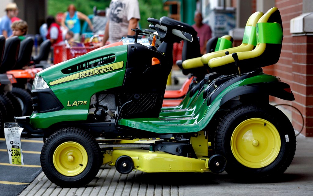 A John Deere riding lawn mower on display, John Deere is one of the best lawn mower brands