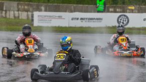 Several kart racers driving around the wet track at the 2020 Prince Carl Philip Racing Trophy at GTR Motorpark in Eskilstuna, Sweden