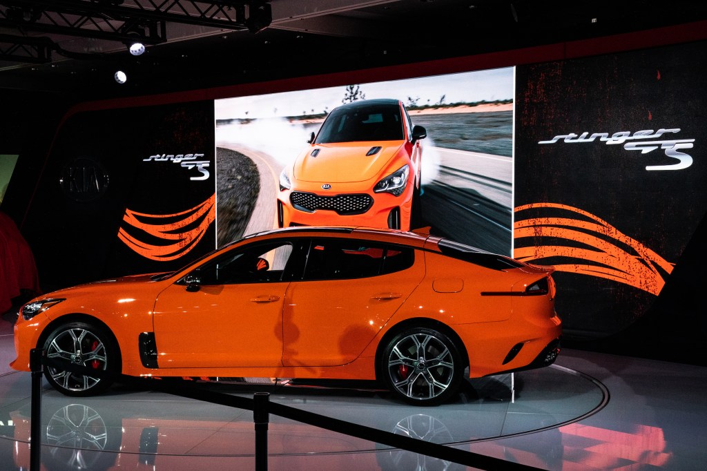 An orange Kia Motors Corp. Stinger vehicle is displayed during the 2019 New York International Auto Show (NYIAS)