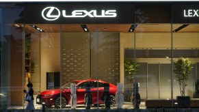 A red Toyota Motor Corp. Lexus IS300 sedan at a Lexus dealership in Tokyo, Japan