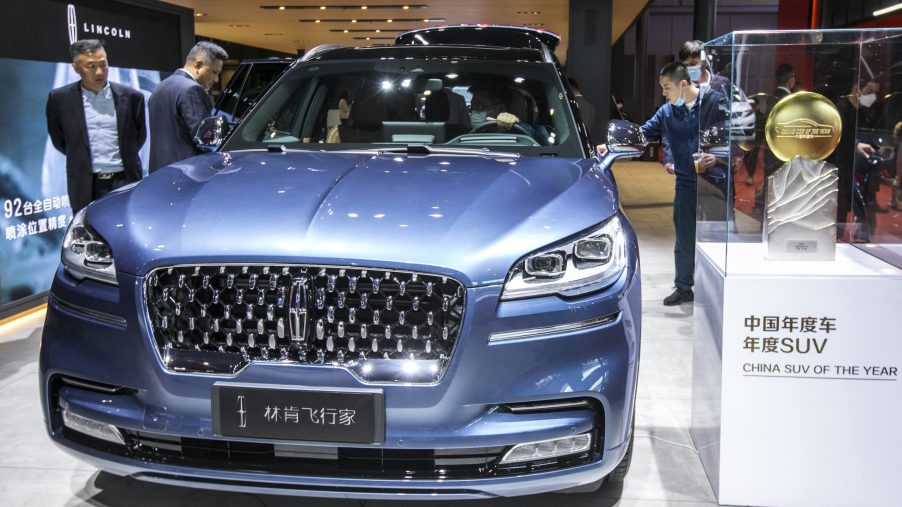 A blue Lincoln Aviator car is on display during the 19th Shanghai International Automobile Industry Exhibition