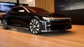 A black Lucid Air Grand Touring electric luxury car is displayed at the Lucid Motors Inc. studio and service center