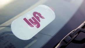 A Lyft decal is displayed on a car window in Los Angeles, California, on Monday, November 13, 2017