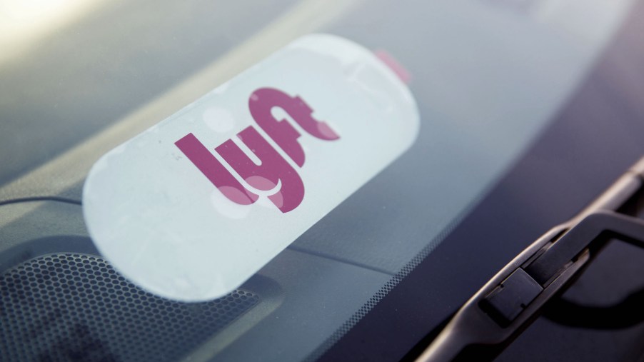 A Lyft decal is displayed on a car window in Los Angeles, California, on Monday, November 13, 2017