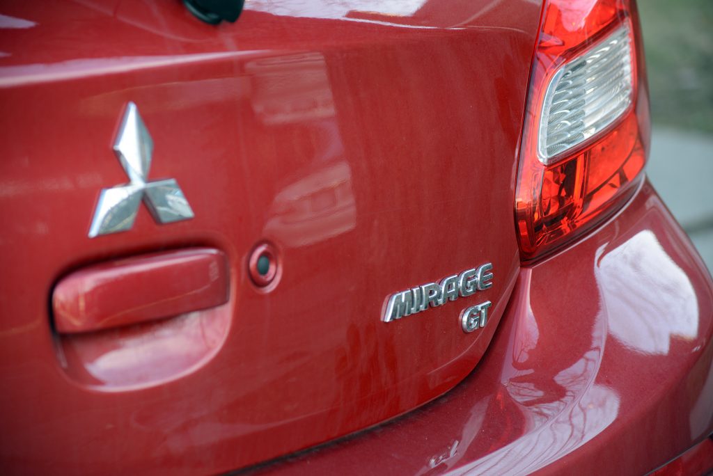 Red rear of a 2018 Mitsubishi Mirage GT.