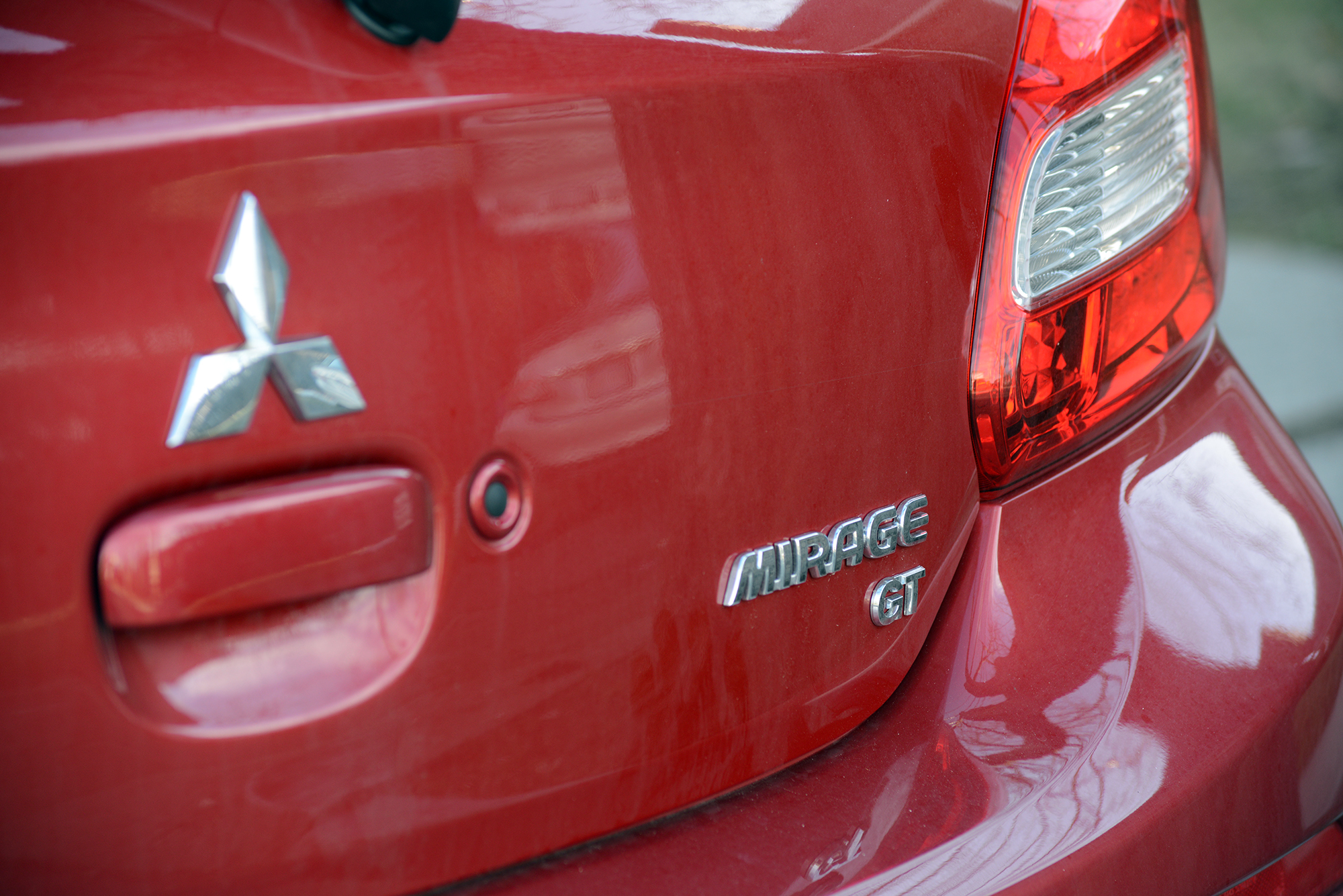 Red rear of a 2018 Mitsubishi Mirage GT.