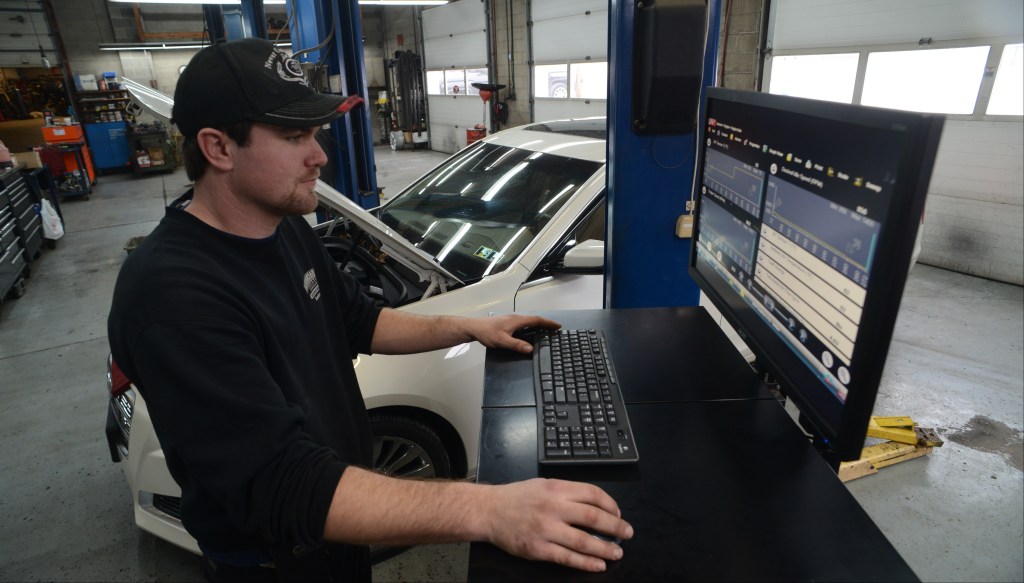 Modern car service technician