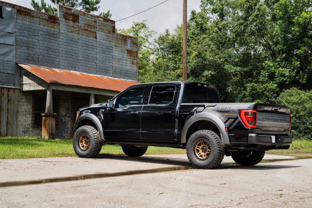 the 2021 Ford F-150 after getting the PaxPower treatment with hood scoop, graphics, and fresh wheels