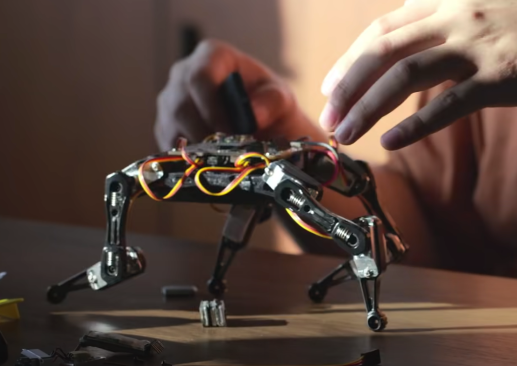 Robot dog Bittle without head and body to show components
