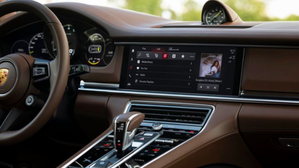 A Porsche PCM 6.0 Infotainment System inside the interior of a Porsche vehicle.