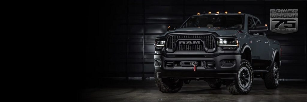 A dark gray 2021 Ram Power Wagon against a black background.